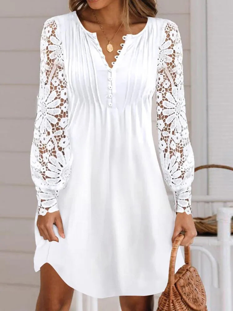 Vestido Ibicenco Blanco de Encaje con Bordado Elegante y Mangas de Farol